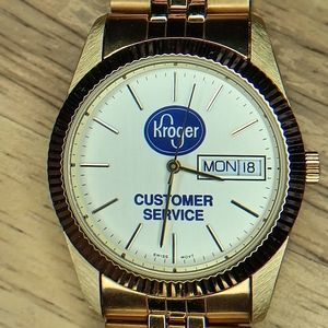 X Selco Geneve 35 mm Gold tone case. Swiss 3 Hand movement with Day